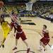 Michigan sophomore Trey Burke attempts a layup past Indiana sophomore Cody Zeller during the second half at Crisler Center on Sunday, March 10, 2013. Melanie Maxwell I AnnArbor.com